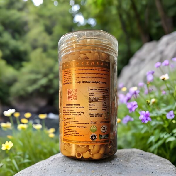 Back view of Carrot Pasta Macaroni jar with nutrition facts, ingredients (20% carrot, 80% suji), and natural food certifications.